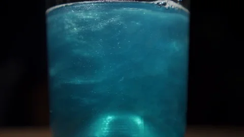 Blue champagne with bubbles in a bottle Stock Footage 114181578