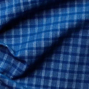 Blue checkered tablecloth as a background, close-up Stock Photos