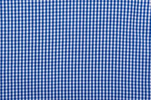 Blue checkered textile, part of checkered shirt, top view as background Stock Photos