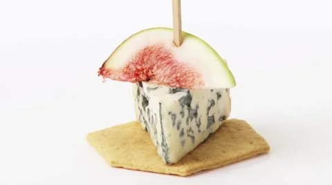 Blue cheese and fig on cocktail stick on cracker Stock-Footage 8572018