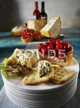 Blue cheese, crackers and pie Stock Photos
