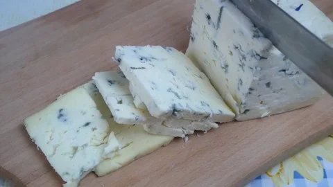 Blue cheese pieces  Stock Footage 83772963
