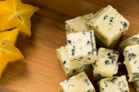 Blue cheese on wooden background. Stock Photos