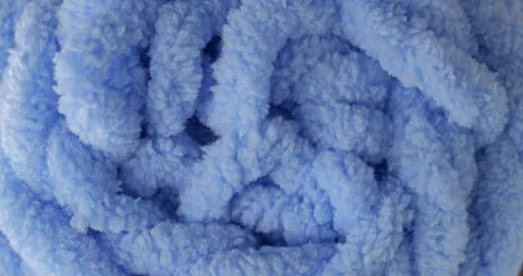 Blue chenille yarn texture with raised loops and soft woven detail Stock Footage 345027520