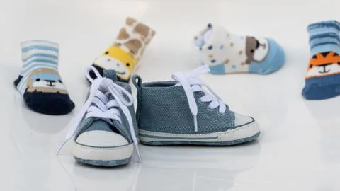 Blue children's sneakers with laces. Stock Photos
