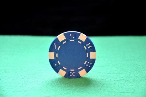 Blue chip balancing on the edge Stock Photos