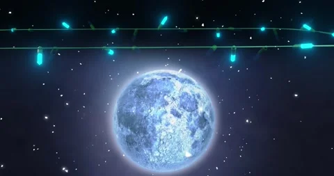 Blue christmas string lights flashing over falling snow and full moon in night Stock Footage 253158768