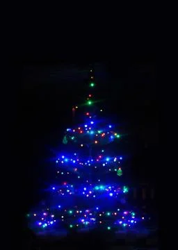 Blue Christmas tree of lights Stock Photos