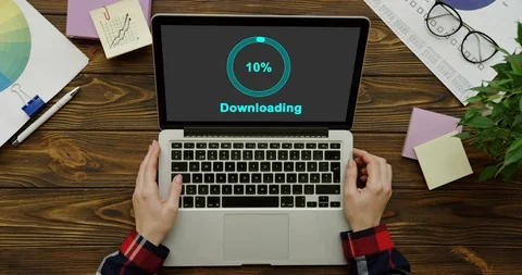 Blue circle of percents loading in the black screen of the laptop computer which Stock Footage 95048709