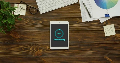 Blue circle of percents loading in the black screen of the white tablet computer Stock Footage 95059920