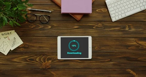 Blue circle of percents loading in the black screen of the white tablet computer Stock Footage 95064738