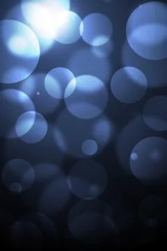 Blue circles on a dark background Stock Photos