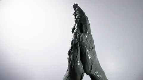 Blue clay for SPA procedures or for sculpting. Man is preparing the clay for art Stock Footage 125598864