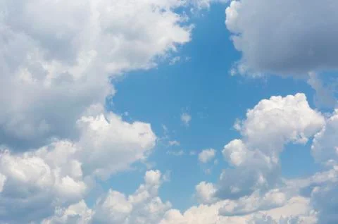Blue clean sky with white clouds. Stock Photos