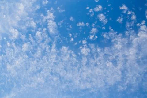 Blue clean sky with white clouds background Stock Photos