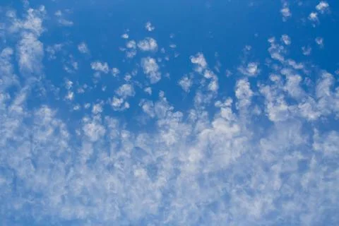 Blue clean sky with white clouds background Stock Photos