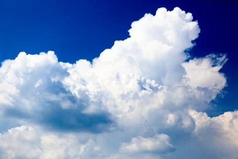 Blue clear sky with clouds Stock Photos