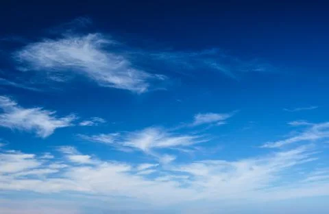 Blue clear sky with clouds Stock Photos