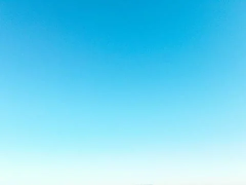 Blue clear sky, gradient background Stock Photos