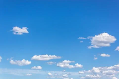 Blue clear sky with white clouds Stock Photos