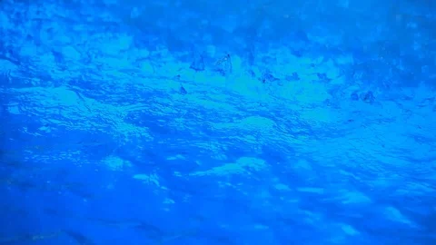 Blue clear water with small waves and splashes Stock Footage 92210722