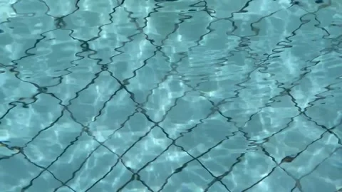 Blue clear water wave texture with checkered pattern Stock Footage 247351287