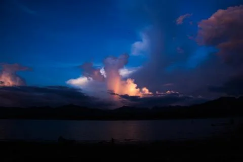 Blue cloud with rainbow Stock Photos