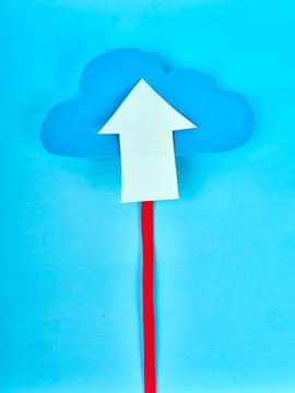 Blue cloud with white upload arrow and red data line on bright blue background Stock Photos