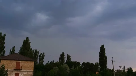 Blue clouds. Evening city in rainy weather. Courtyard in the city. Thunderclouds 動画素材 163742849