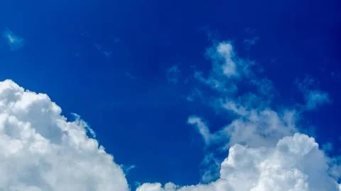 Blue cloudy sky as background Stock Photos