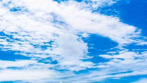 Blue cloudy sky as background Stock Photos