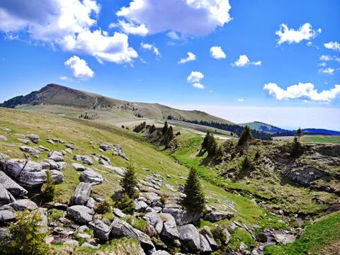 Blue cloudy sky onmountain Stock Photos