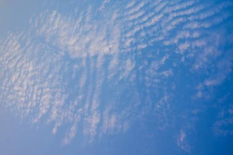 Blue cloudy sky Stock Photos