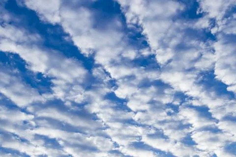 Blue cloudy sky. Stock Photos