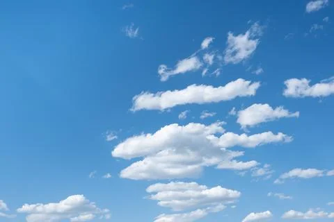 Blue cloudy sky, puffy clouds, Amazing picture of heaven light of nature Fotos de archivo