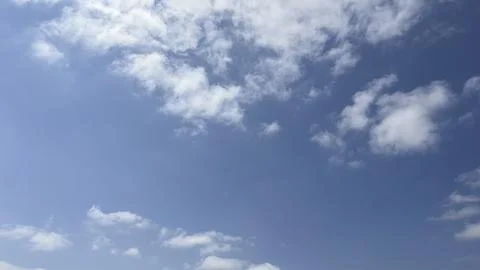Blue cloudy sky texture. Natural sky composition Stock Photos