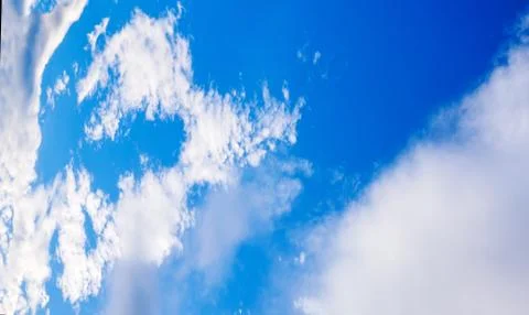 Blue cloudy sky in winter time Stock Photos