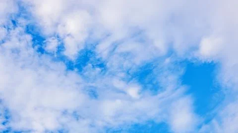 Blue cloudy sky in winter time Stock Photos