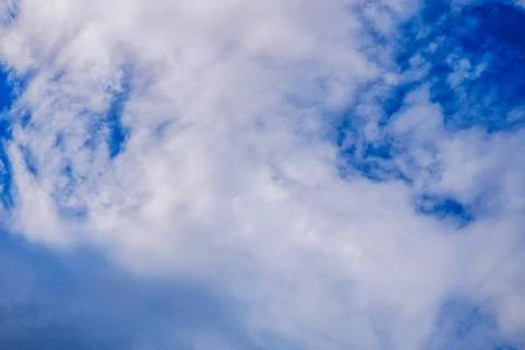 Blue cloudy sky in winter time Stock Photos