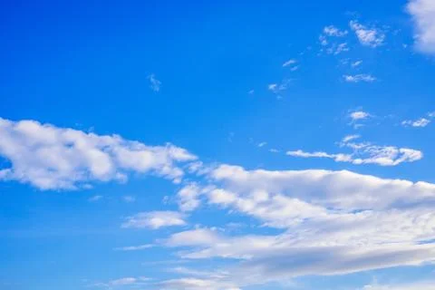 Blue cloudy sky in winter time Stock Photos