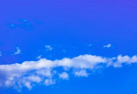 Blue cloudy sky in winter time Stock Photos