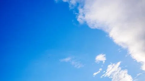 Blue cloudy sky in winter time Stock Photos
