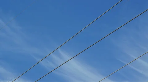 Blue cloudy sky with wires Video stock 36073275