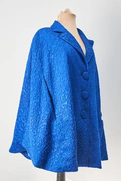 Blue coat on mannequin. Executive fall clothing. Stock Photos