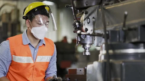 Blue-collar Worker. asian team of technician and engineer are checking machinery Video stock 195109999