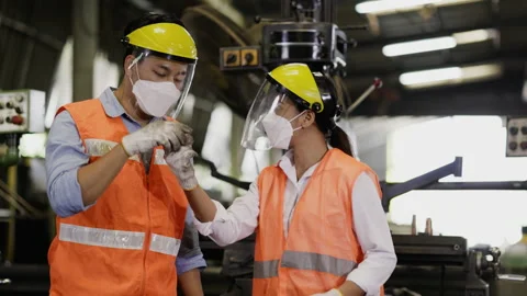 Blue-collar Worker. asian team of technician and engineer are checking machinery Video stock 195110446