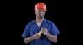 Blue collar worker - break time - peals and starts to eat banana HD Footage