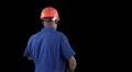 Blue collar worker - break time - pretends to be working with back  turned HD Footage