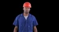 Blue collar worker - break time - pulls apple from pocket HD動画