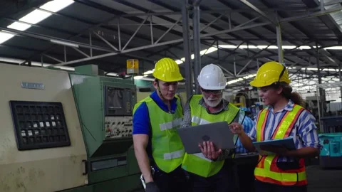 Blue-collar Worker. multi-ethnic team of technician and engineer are checking Stock-Footage 196437577